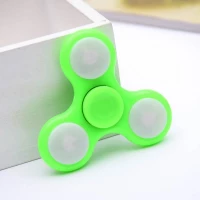 Fidget spinner s LED osvětlením 7 cm zelený