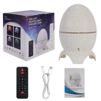 RealG RC-K-1932 Projektor hvězd Dino vejce s Bluetooth reproduktorem, LED noční lampička USB