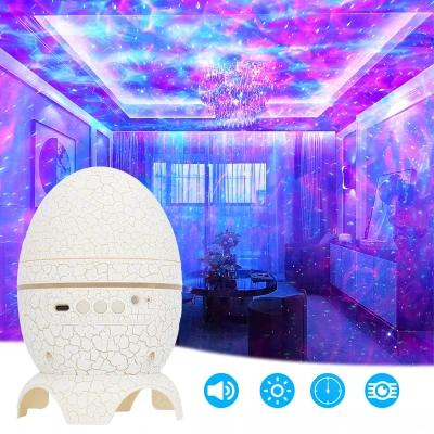 RealG RC-K-1932 Projektor hvězd Dino vejce s Bluetooth reproduktorem, LED noční lampička USB