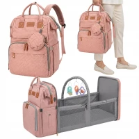 Verk 27815 Multifunkční batoh pro maminky s cestovní postýlkou, USB port, růžový